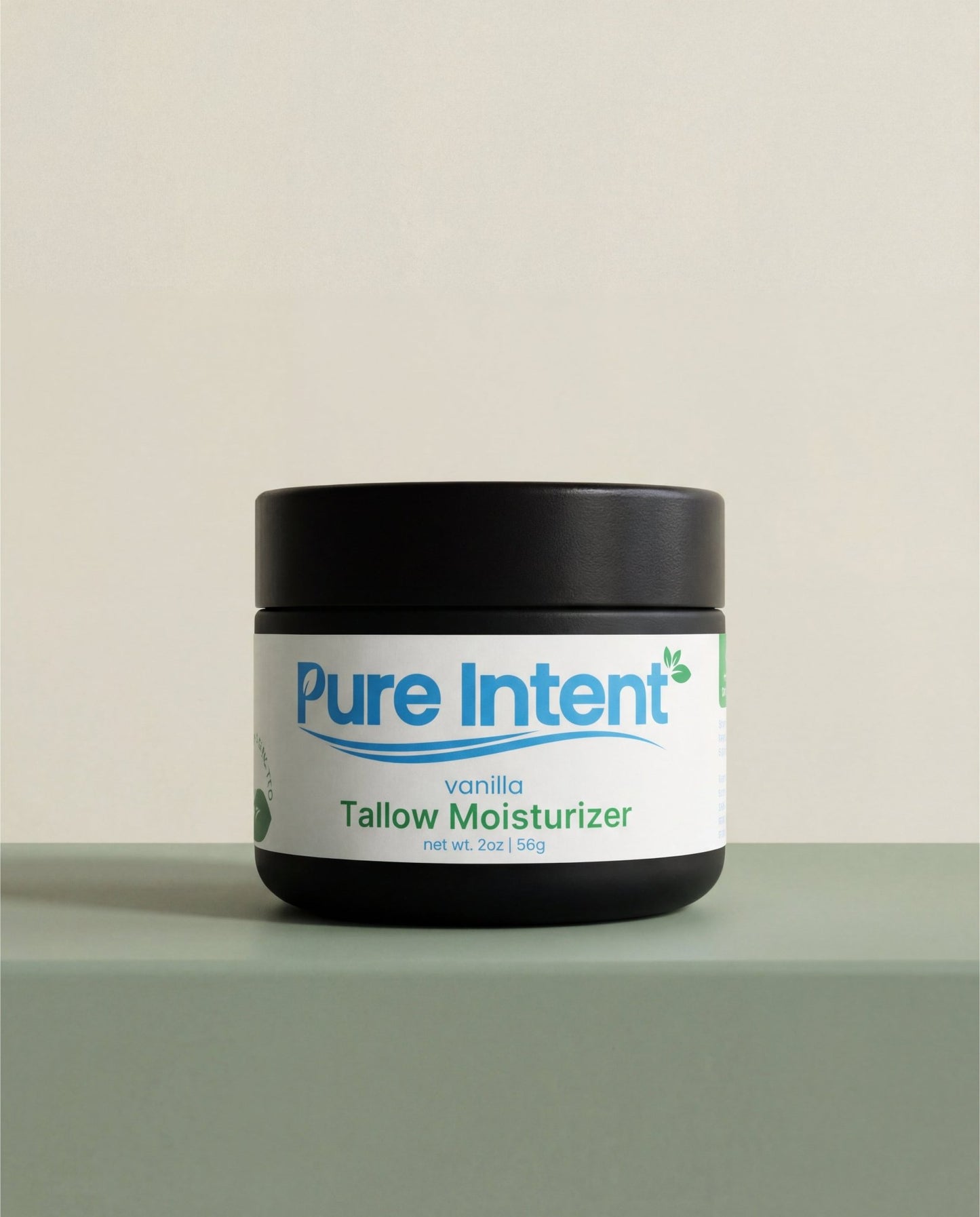 Jar of Pure Intent vanilla tallow moisturizer on a neutral background